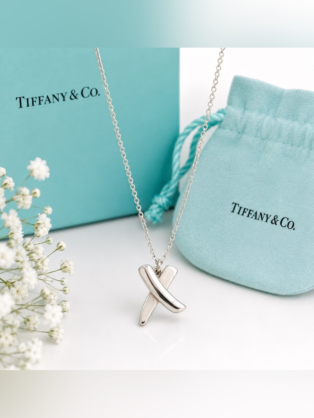 Tiffany and Co Sterling Silver X Kiss Necklace